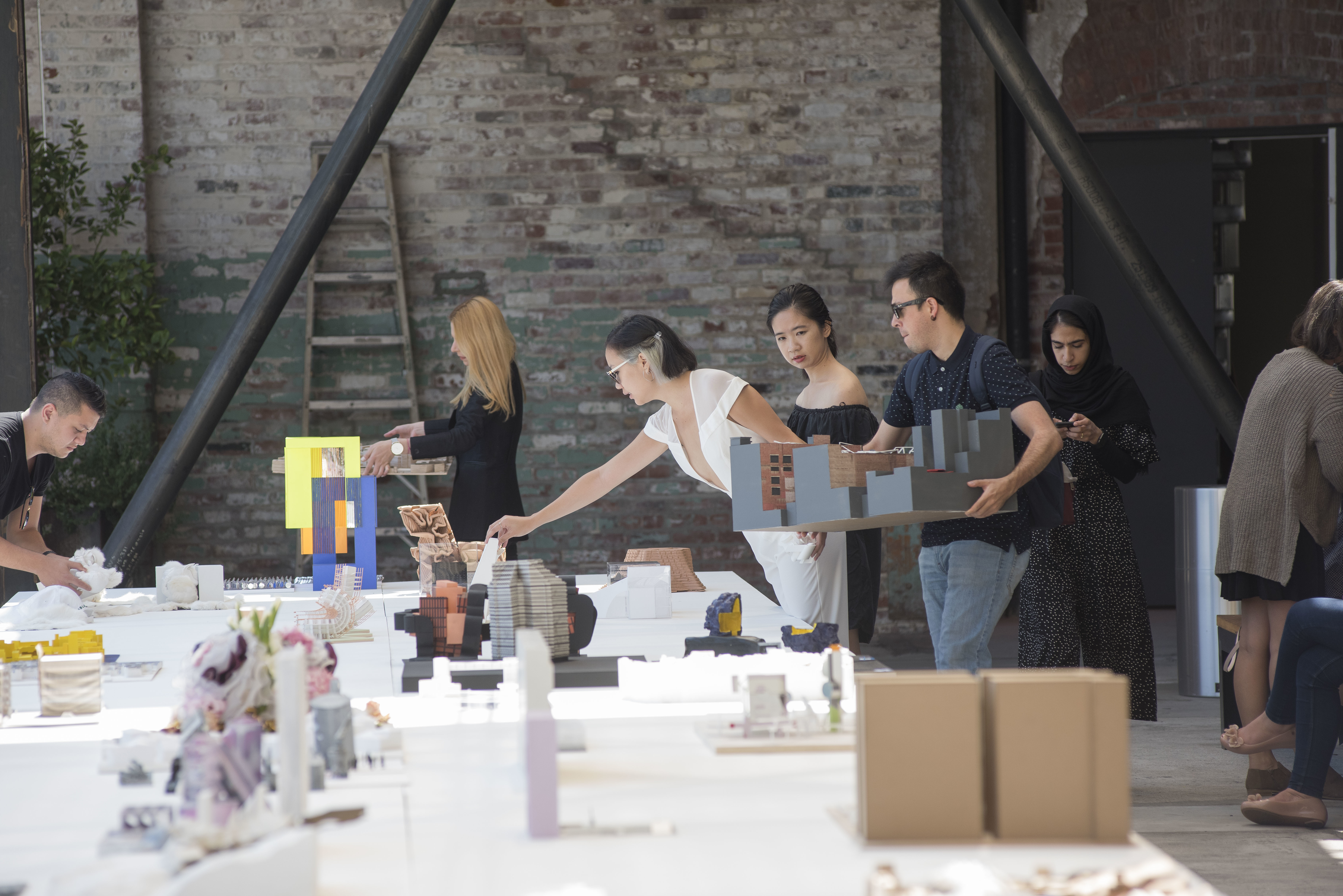 Wirth Schimmel Thesis students arranging architectural models