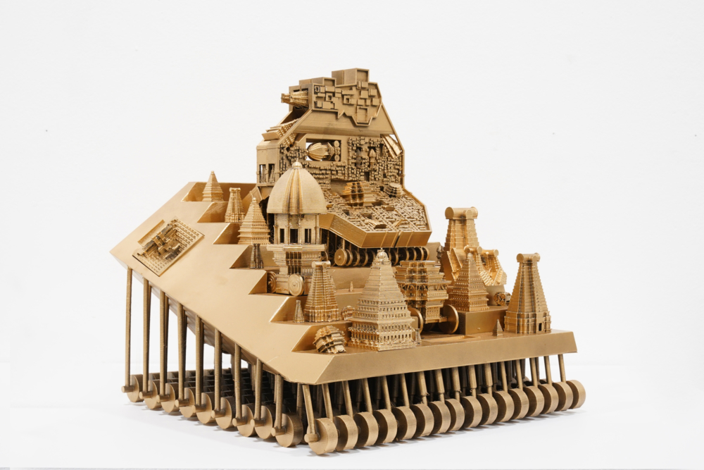 gold architecture model on wheels
