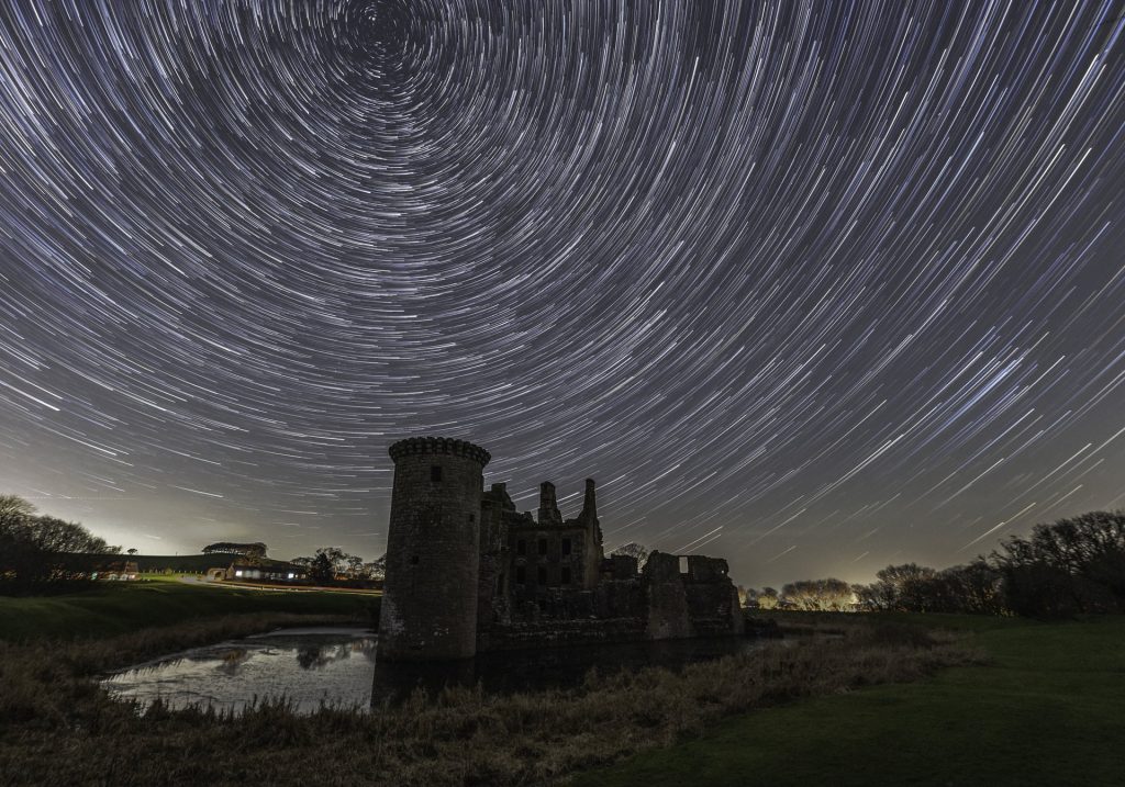 Spectacular dark skies above Caerlaverock Castle in Dumfries and Galloway.