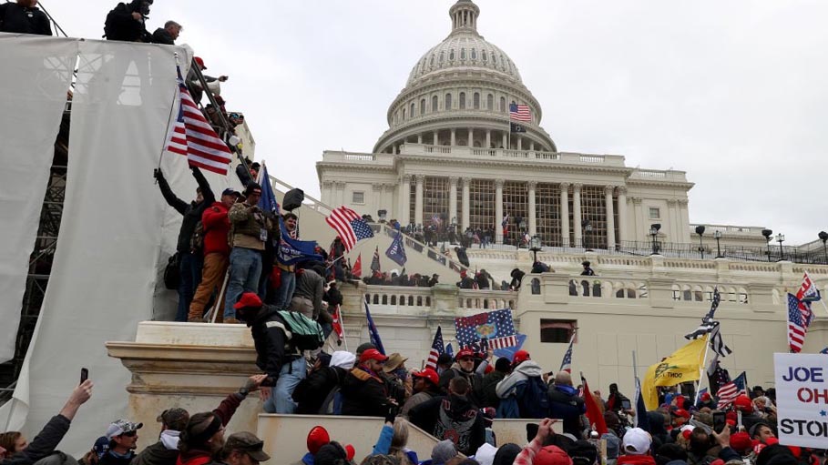 Guns Out, Windows Smashed: Protesters Turn Congress into Battlefield
