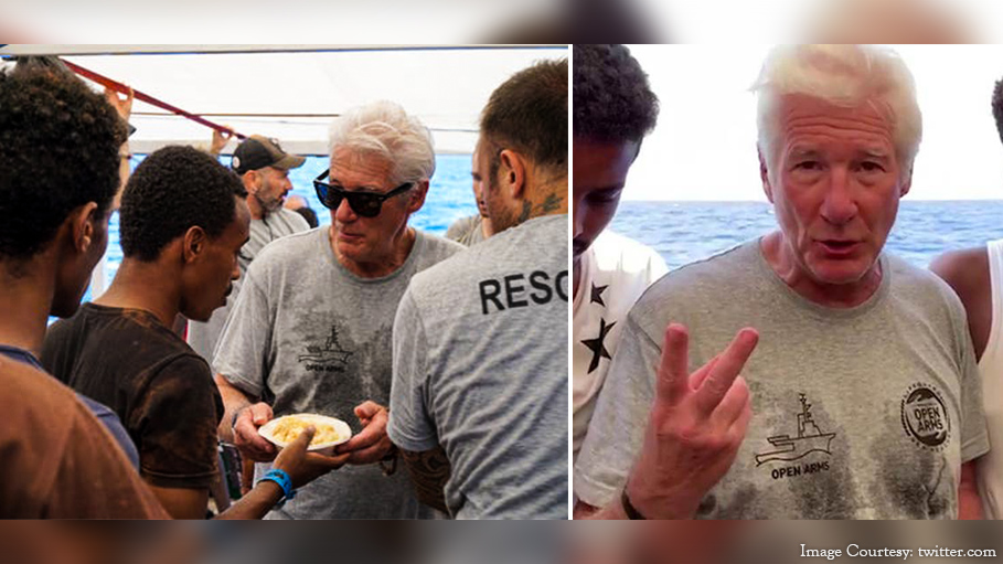 Actor Richard Gere Distributes Food among Migrants on a Ship Stranded in the Mediterranean