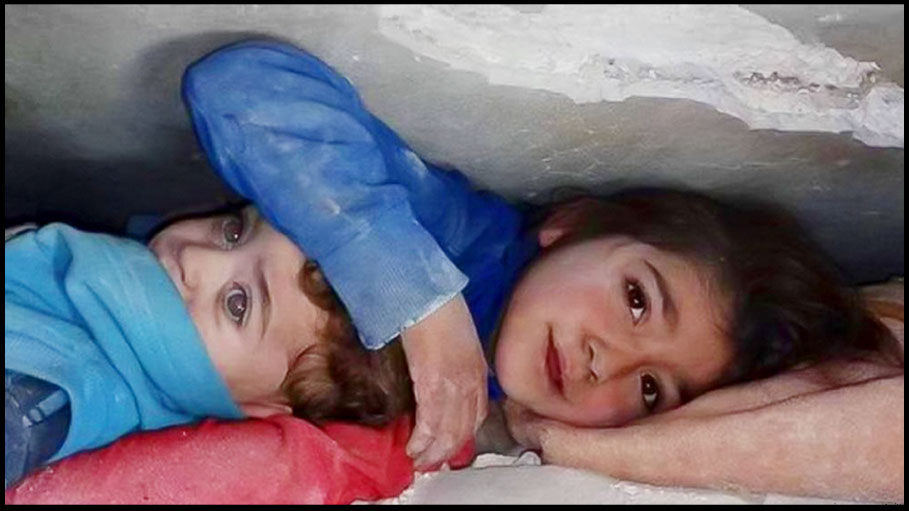 Sister Protects Brother Beneath The Rubble by Placing Her Hand over His