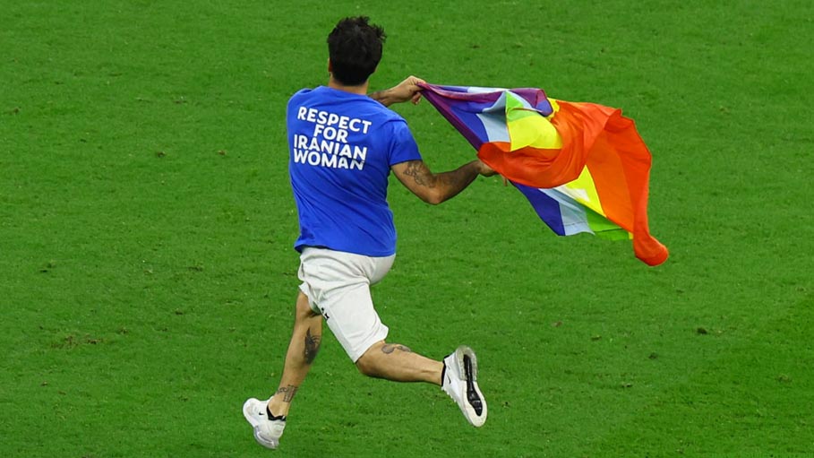 Man with Rainbow Flag Invades Pitch during FIFA World Cup Match