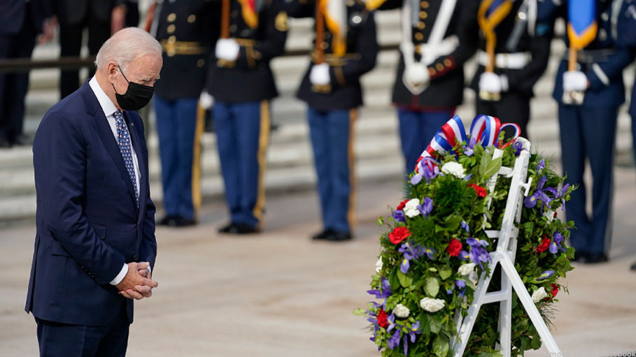 On Veterans Day, Biden Honors Troops as "Spine of America"