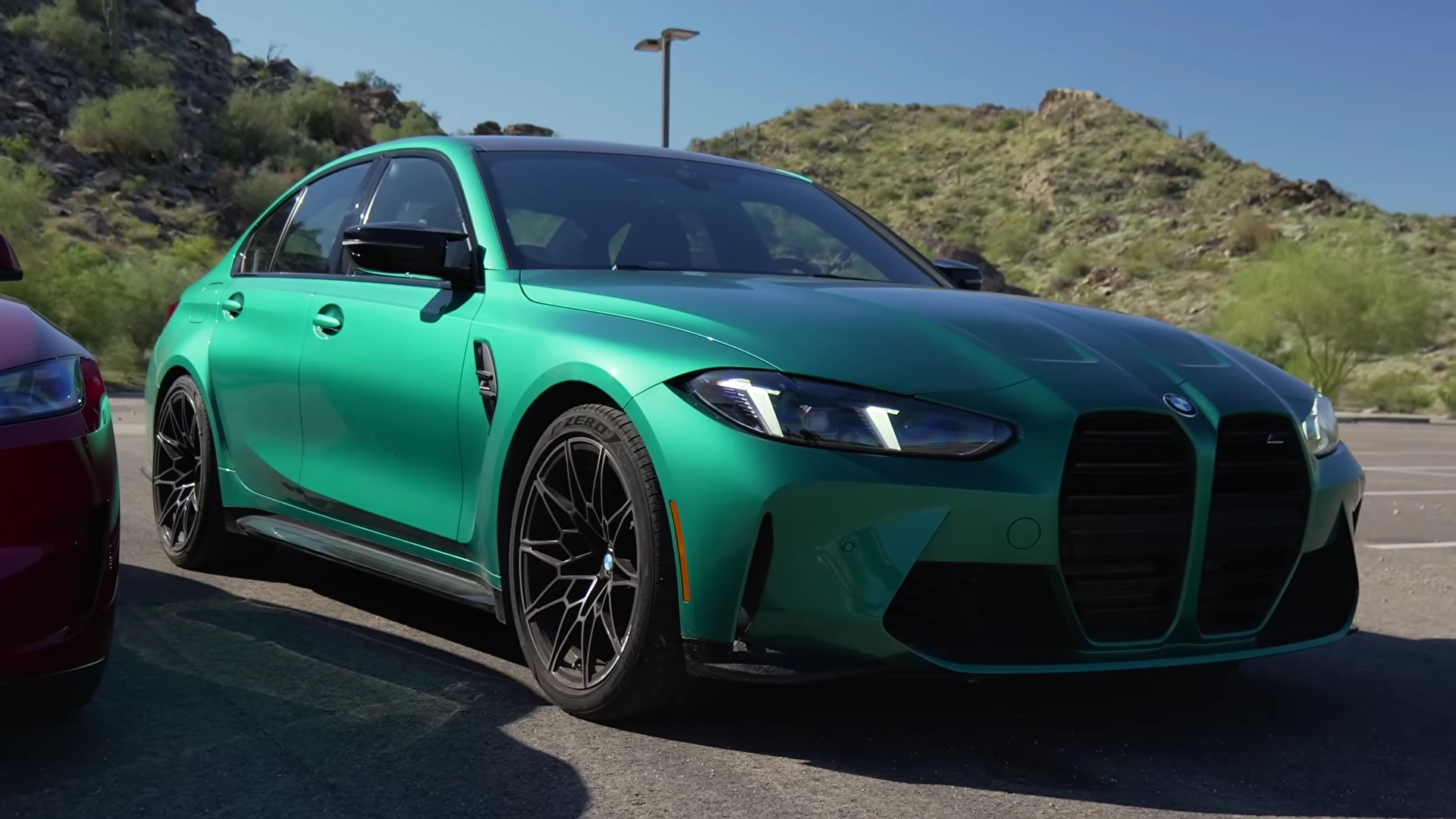 Side-by-side comparison of the Tesla Model 3 Performance and BMW M3 Competition.