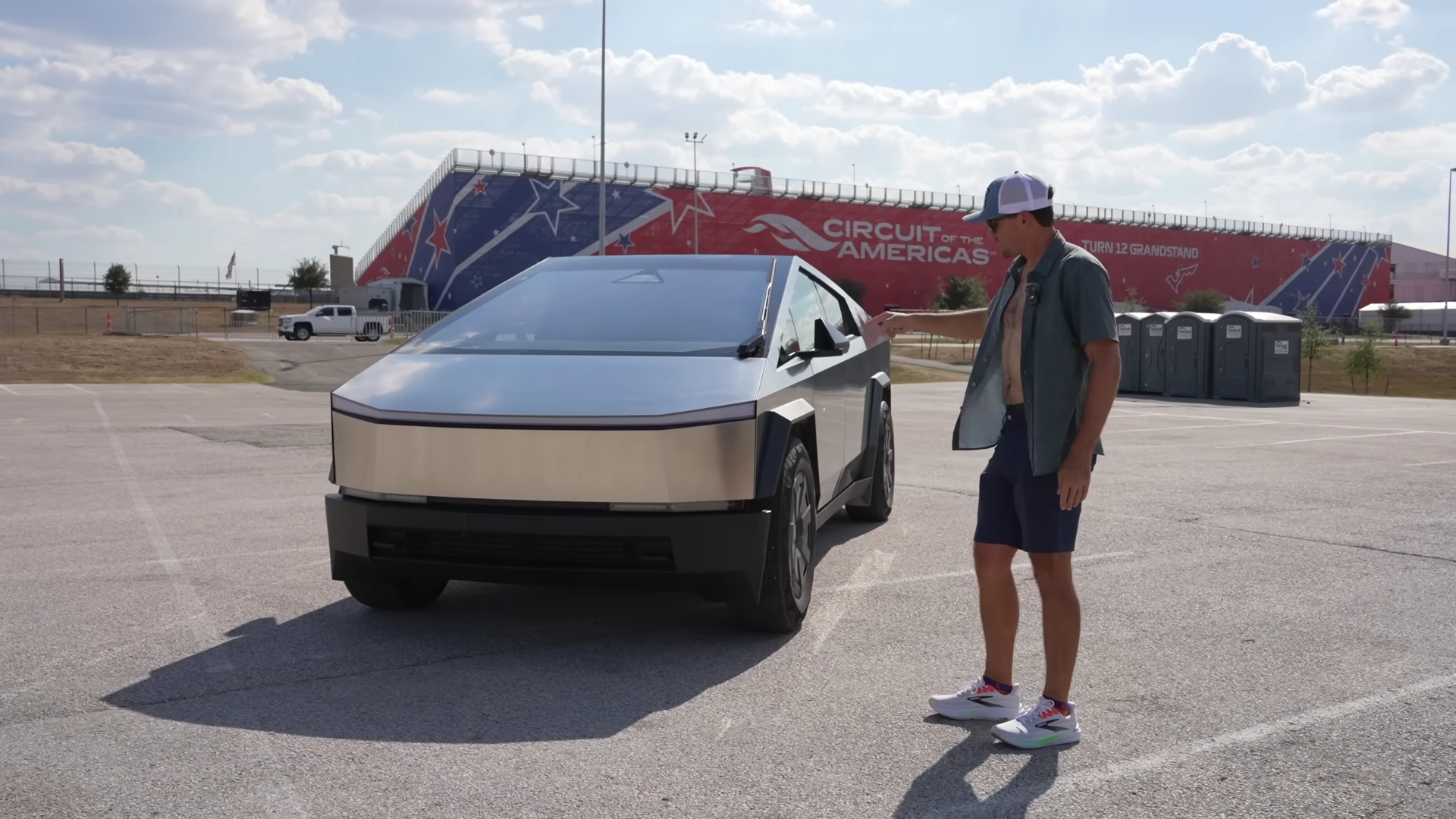The 2025 Tesla Cybertruck exterior view showing the stainless steel exoskeleton and futuristic design.