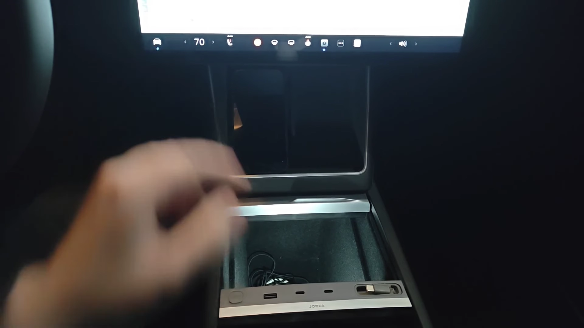 Navigating to the Charging menu within the Tesla vehicle settings.
