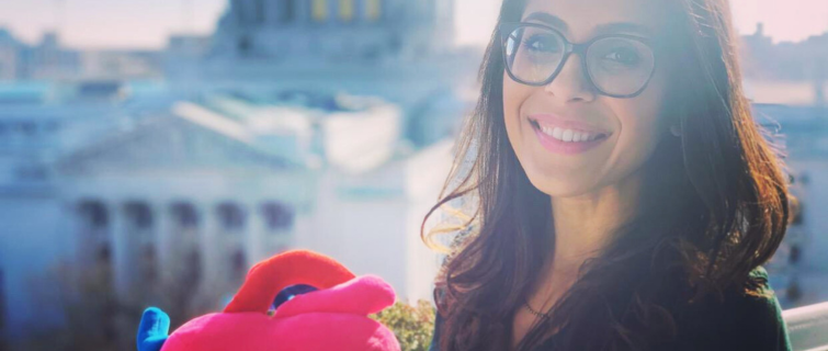 Ronak Mehta, M.D. poses with Nerdbug.