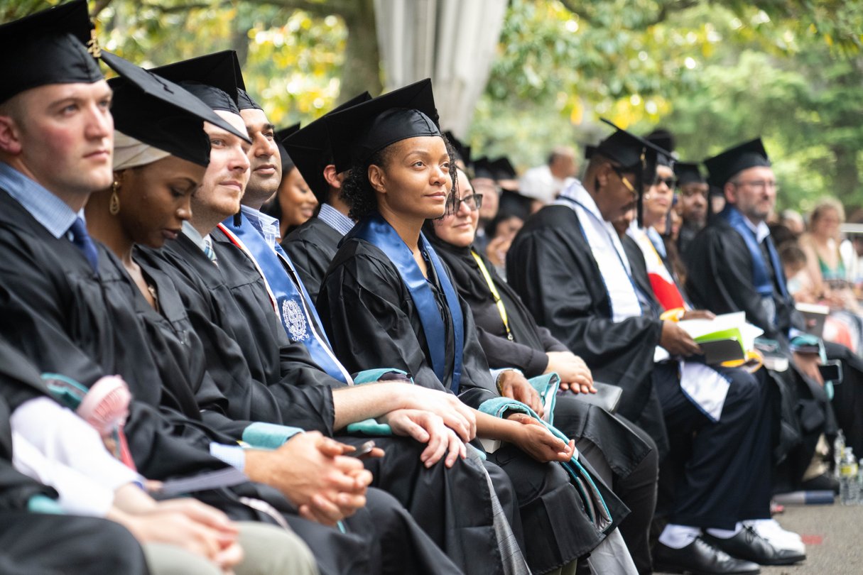 Woman smiling during Georgetown commencement.