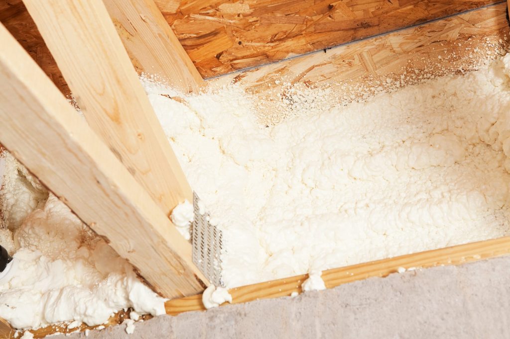 photo showing how insulation and air sealing along your foundation and rim joist in the basement can eliminate drafts