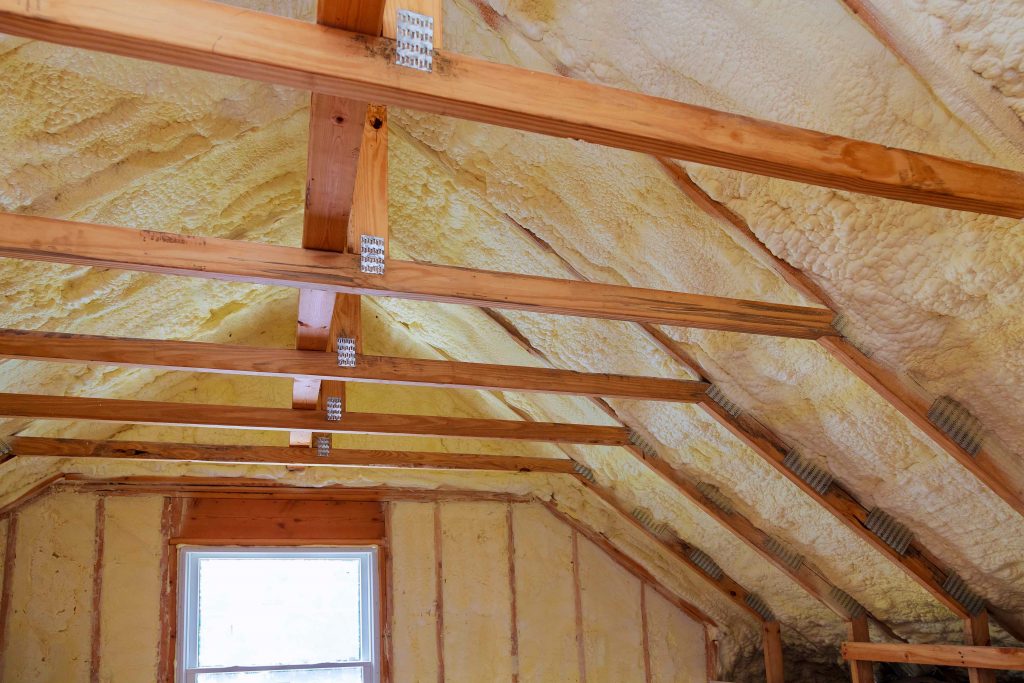 spray foam insulation and air sealing inside attic beams