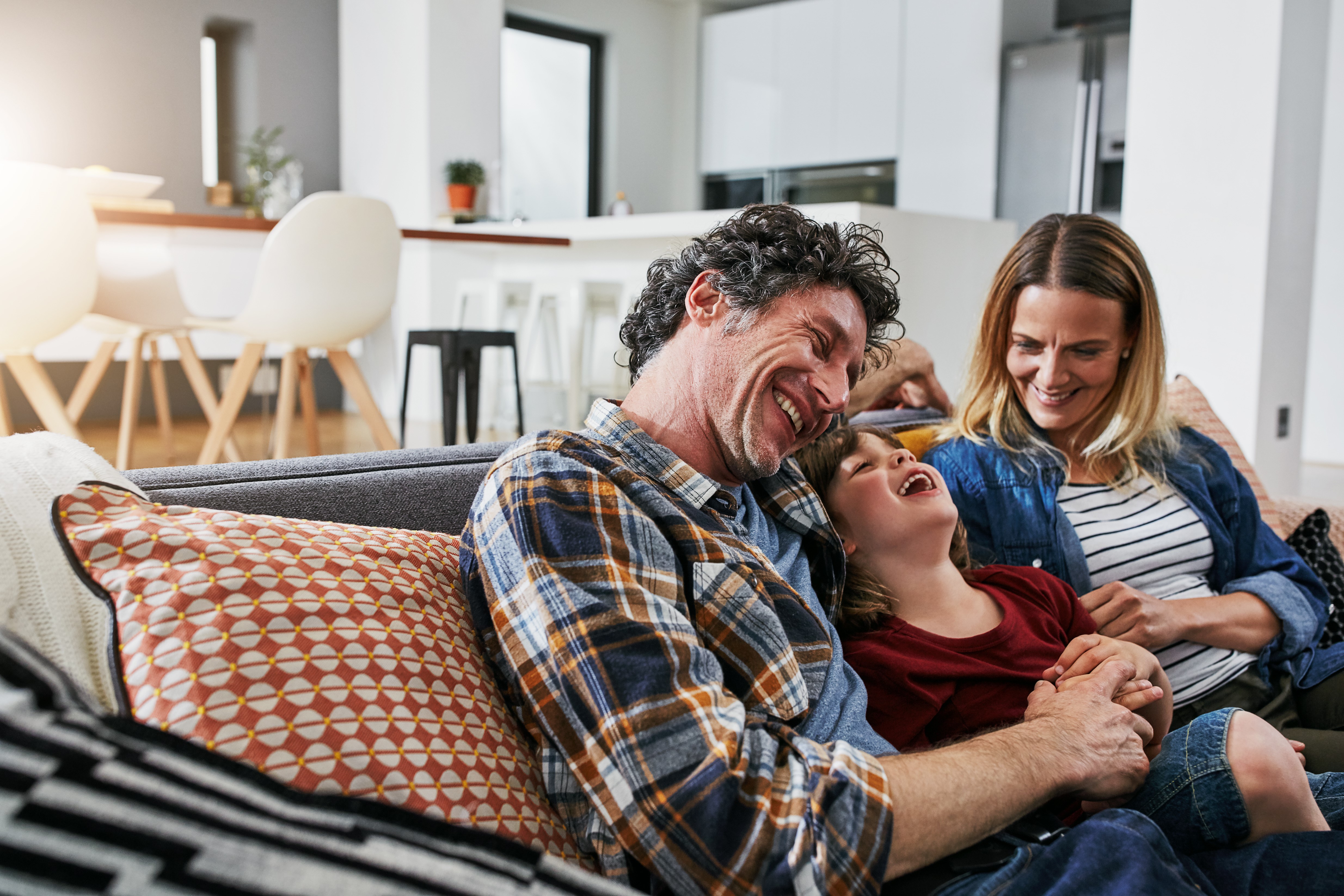 parents and child enjoying a comfortable home