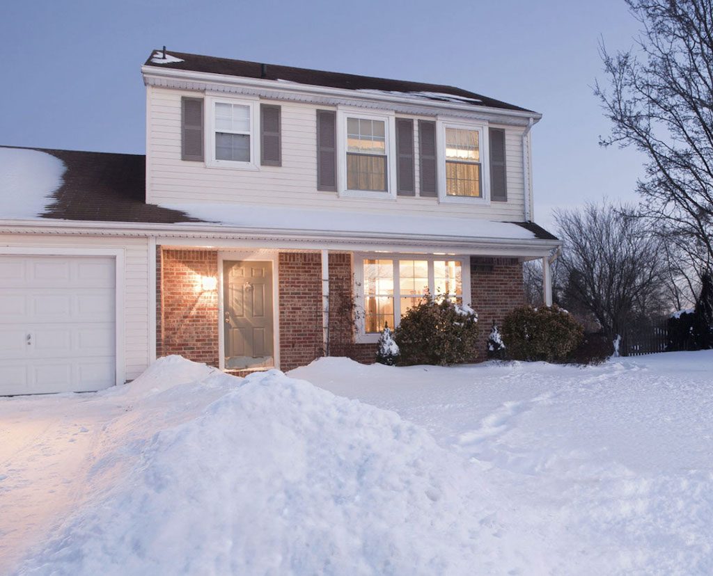 Chicago winter weather—House covered in snow