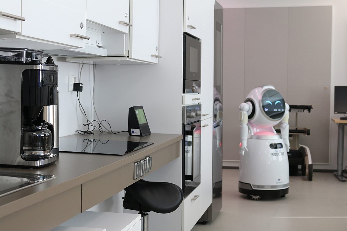 A humanoid robot in a homelike environment.