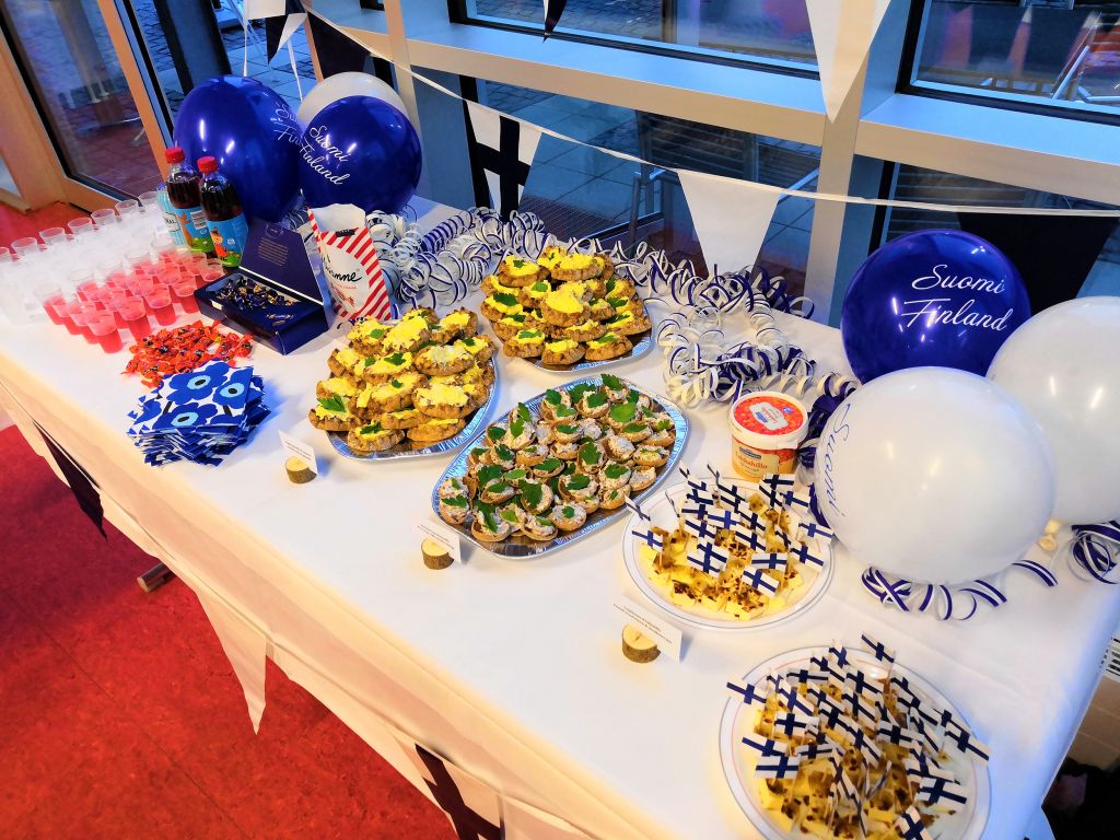 Different types of Finnish food and dishes on a table.