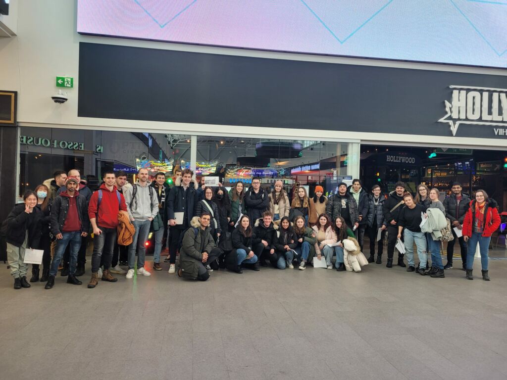 A large group of students in a mall.