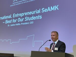 A person standing in a lectern.