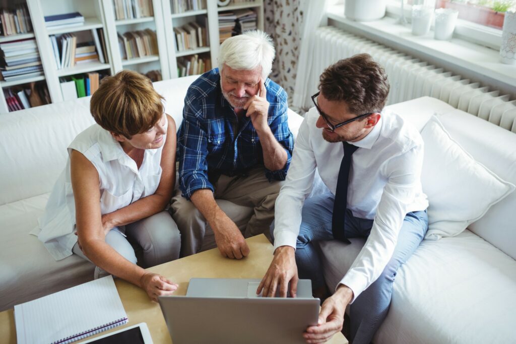 Senior couple planning their retirement with a financial advisor