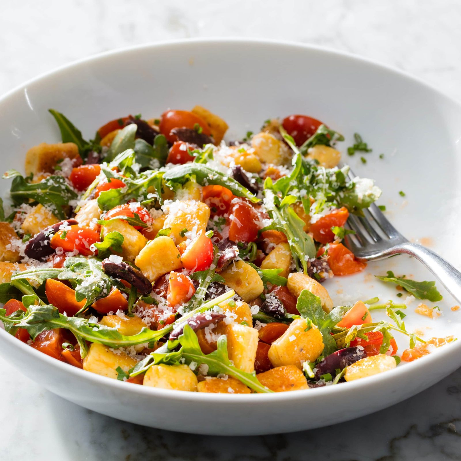 Gnocchi à la Parisienne with Arugula, Tomatoes, and Olives