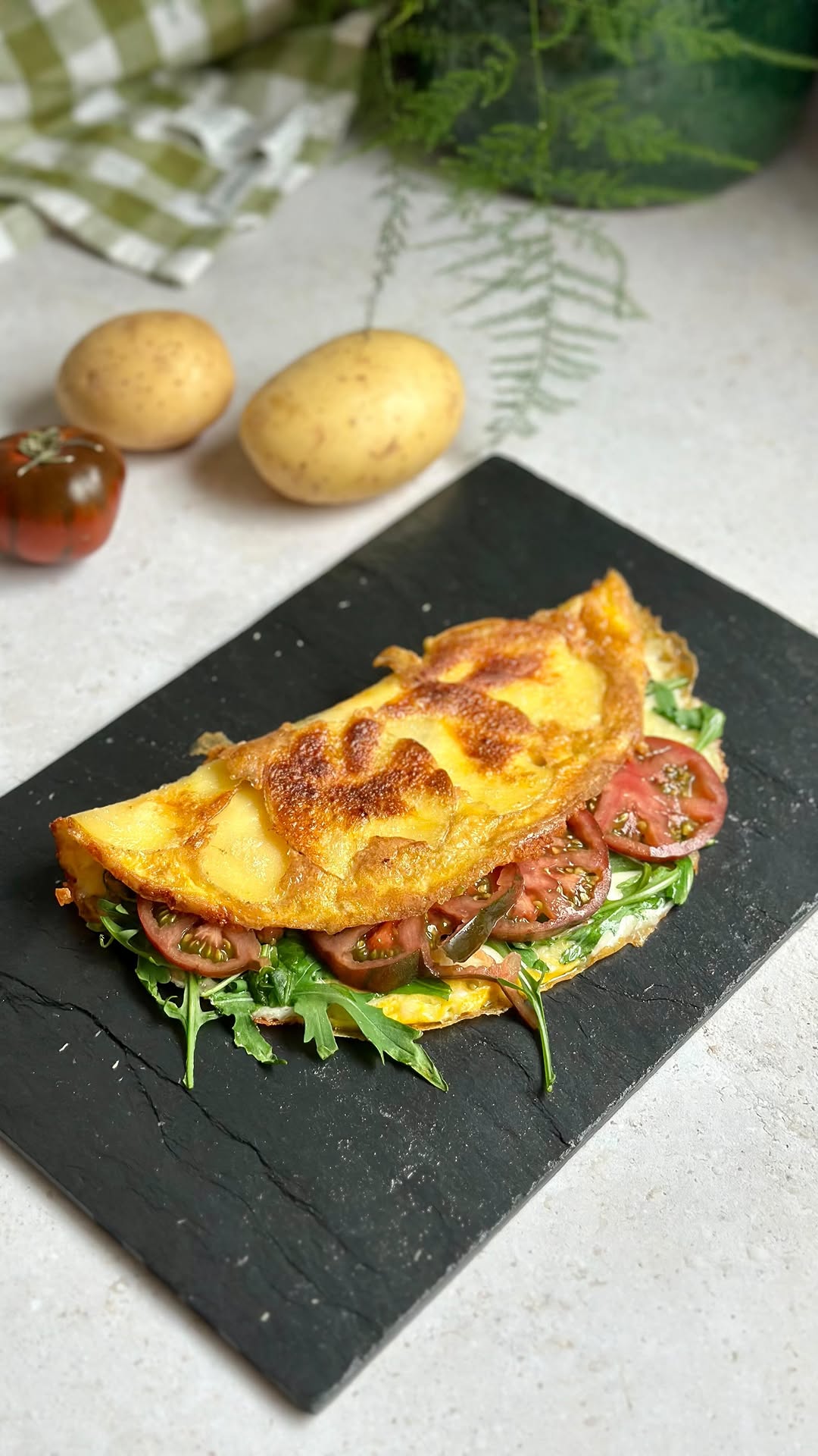 Crispy Potato Omelet with Arugula and Tomato
