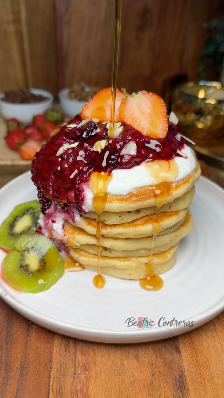 Fluffy Pancakes Filled with Hazelnut Spread and Berry Jam