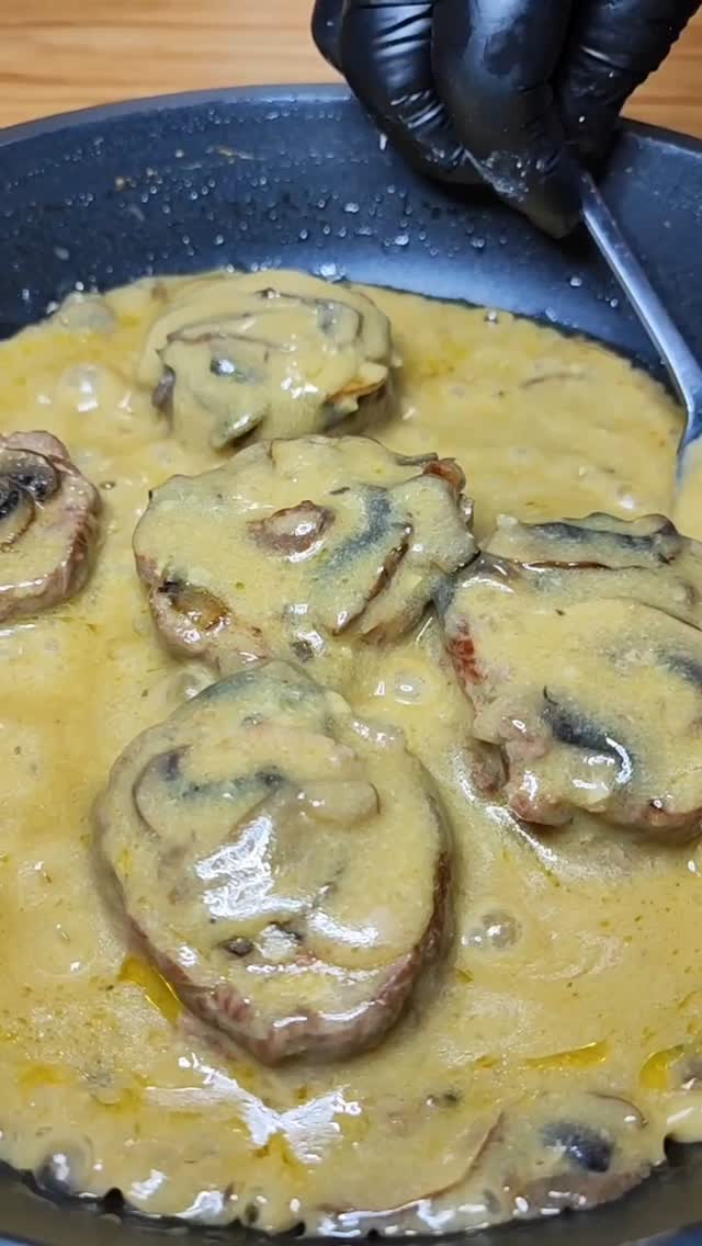 Bacon-Stuffed Filet Mignon with Creamy Portobello Sauce and Ripe Plantain Purée