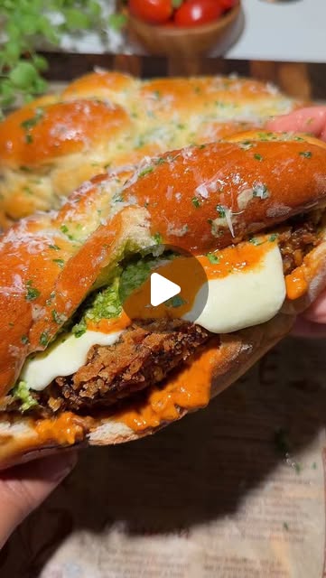 Vodka Chicken Parmesan Sandwich on a Garlic Knot Sandwich Roll