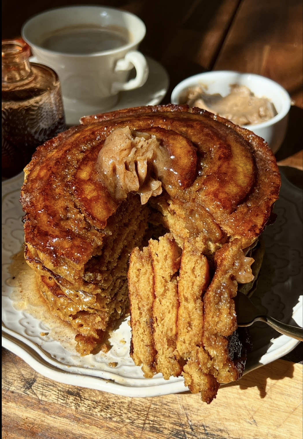Pumpkin Cinnamon Roll Pancakes with Whipped Honey Cinnamon Butter