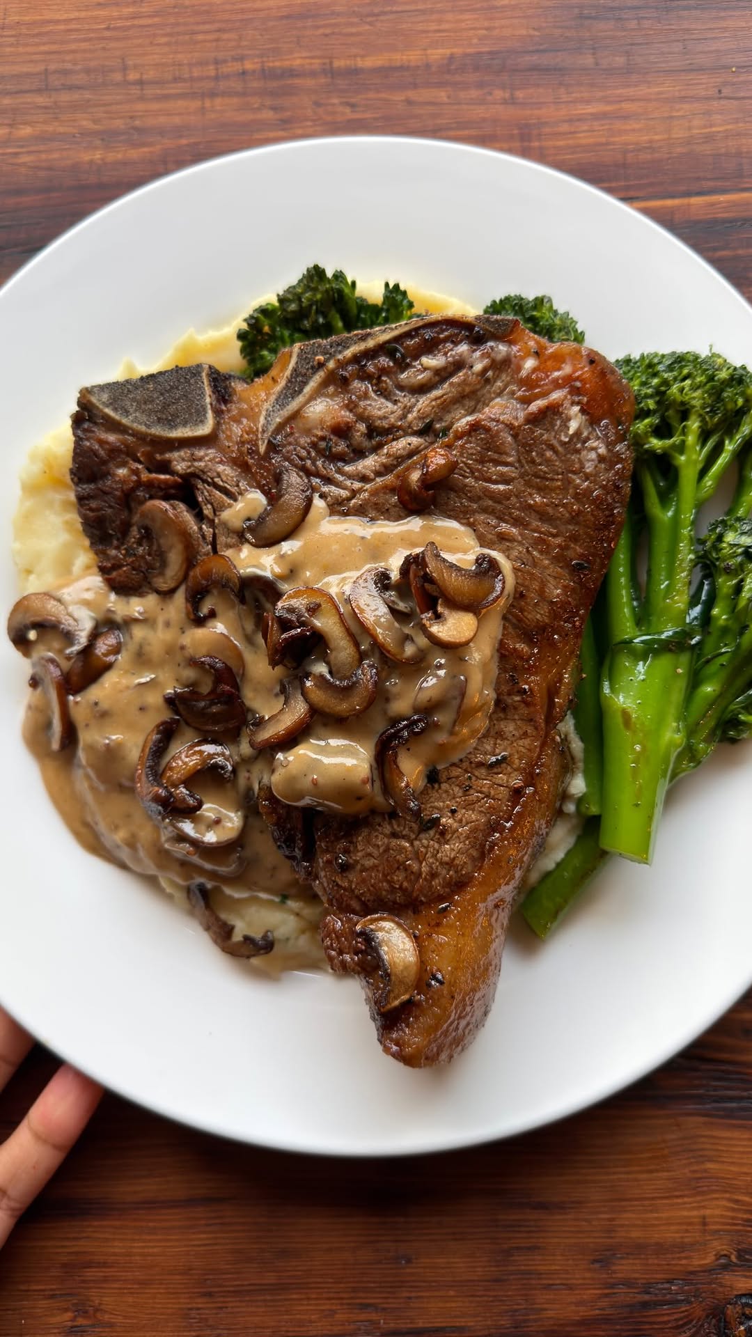 Grilled Steak with Mashed Potatoes and Mushroom Sauce