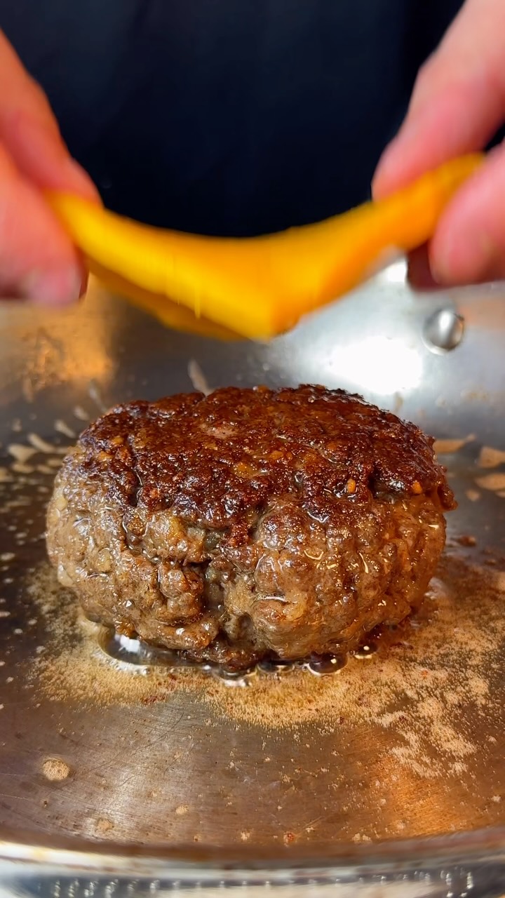 Gourmet Burger with Black Garlic Mayo, Homemade Cheese, and Tomato Relish