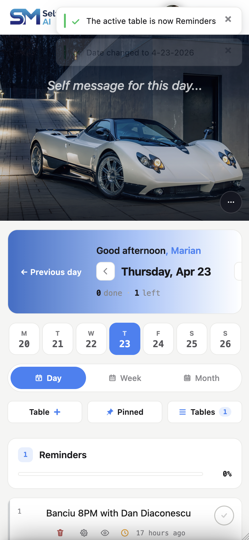 The v4 mobile day view with hero image and date navigation