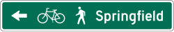 Single line shared-use path destination guide sign