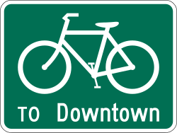 Bike route sign with destination information
