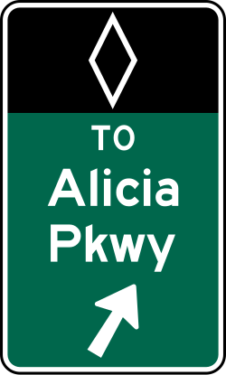 Intermediate egress direction sign for preferential lanes