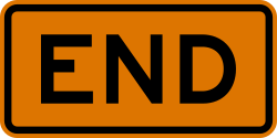 End plaque for use when road work has blocked a road