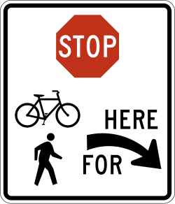 Drivers must stop at a trail crossing on the right side
