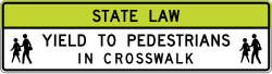 Overhead sign indicating school crossing ahead
