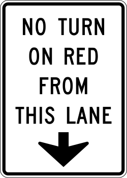 Prohibits turns on red from the specific lane