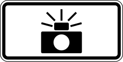 Supplemental plaque with symbol indicating photo enforcement