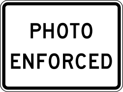 Supplemental plaque indicating photo enforcement