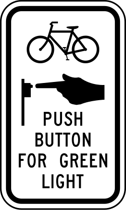 Push button for bicycles to request green light
