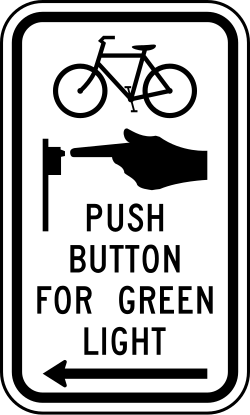 Bicycle push button for green light with directional arrow