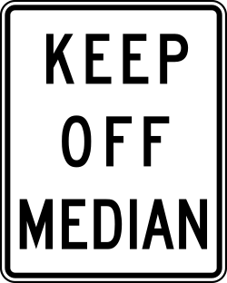 Prohibits vehicles from driving on or crossing the median strip
