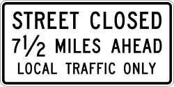 Street is closed ahead at specified distance, allowing only local traffic