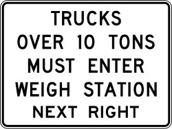 Requires trucks over 10 tons to enter the weigh station at the next right exit
