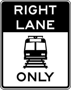 Restricts the right lane to light rail vehicles only