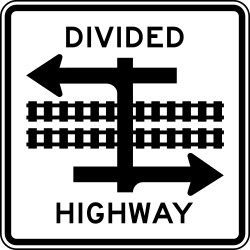 Transit rail crossing on a divided highway