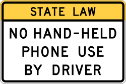 Prohibits the use of hand-held phones while driving