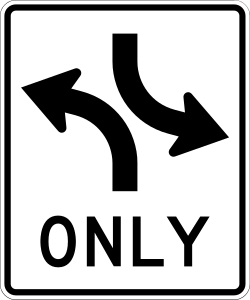 Overhead sign for the shared centre lane used by traffic in both directions to make left turns. It is not a travel lane or a passing lane