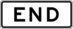 Plaque marking where the two-way left-turn lane ends
